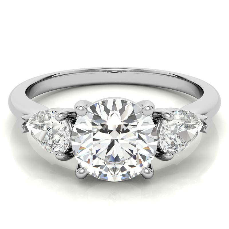 Round Brilliant and Pear Moissanite Three-Stone Ring