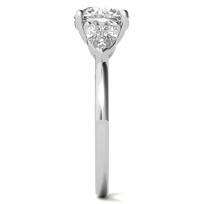 Round Brilliant and Pear Moissanite Three-Stone Ring