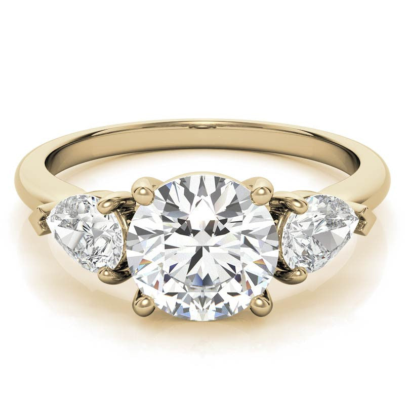 Round Brilliant and Pear Moissanite Three-Stone Ring