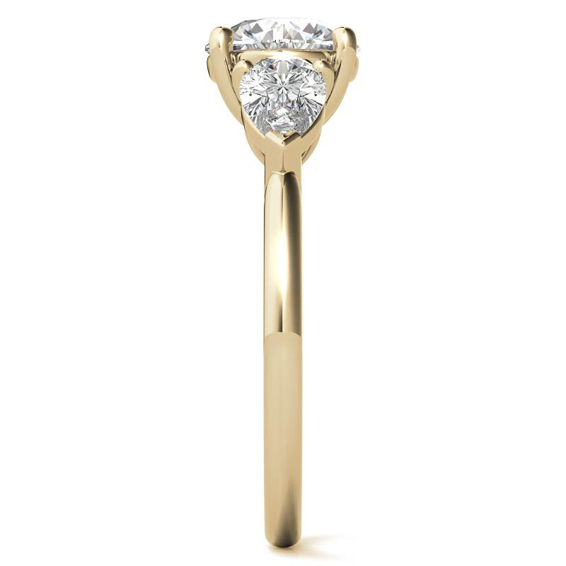 Round Brilliant and Pear Moissanite Three-Stone Ring