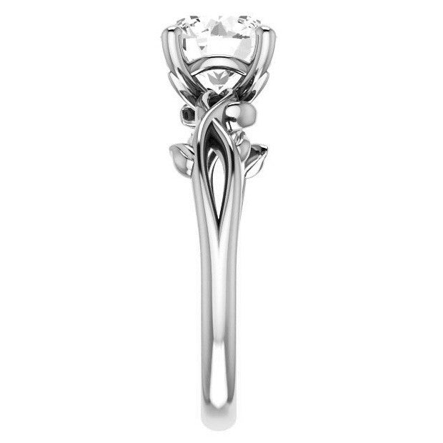 Oval cut Solitaire with Floral Accents