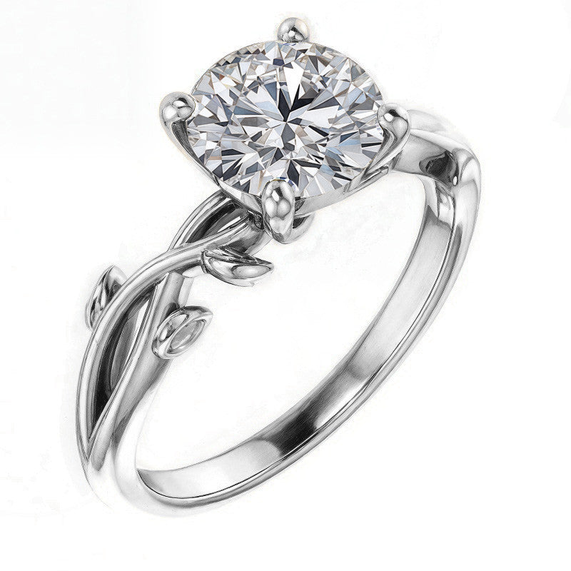 Round Brilliant Moissanite Solitaire Ring With Floral Accents