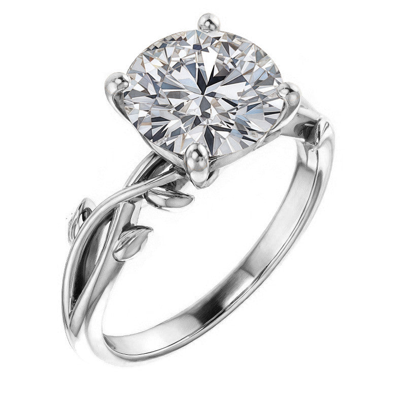 Round Brilliant Moissanite Solitaire Ring With Floral Accents