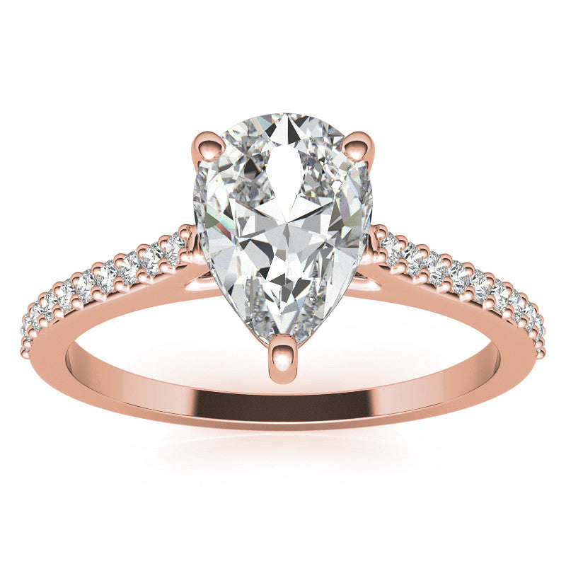 Pear Accented Engagement Ring