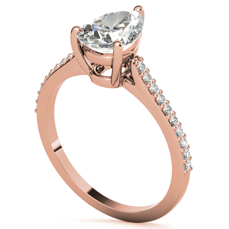 Pear Accented Engagement Ring