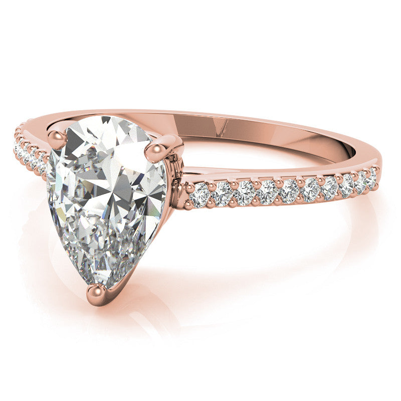 Pear Accented Engagement Ring