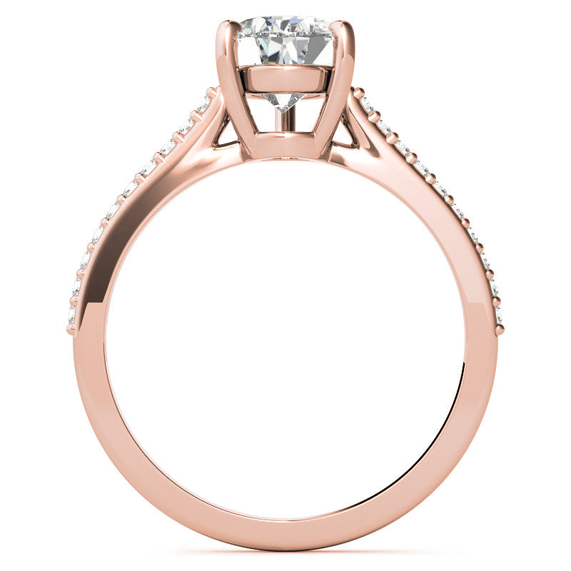 Pear Accented Engagement Ring