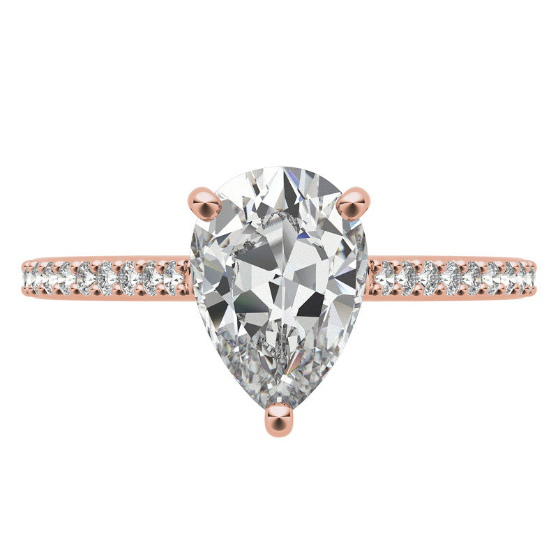 Pear Accented Engagement Ring