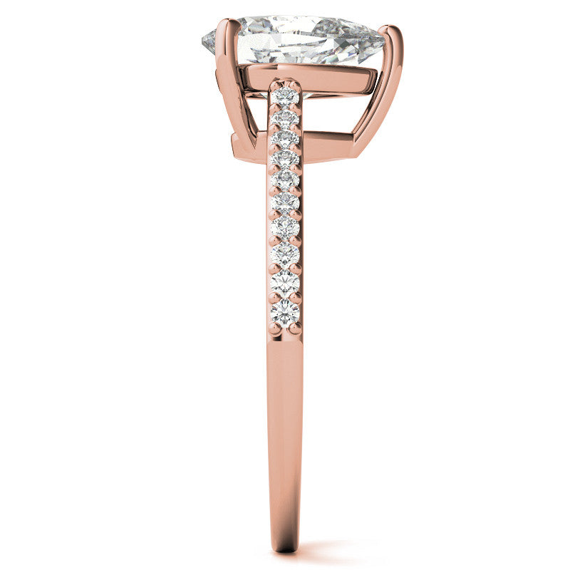 Pear Accented Engagement Ring