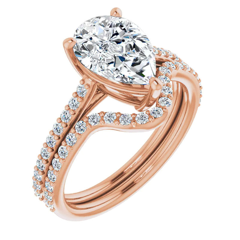 Pear Accented Engagement Ring