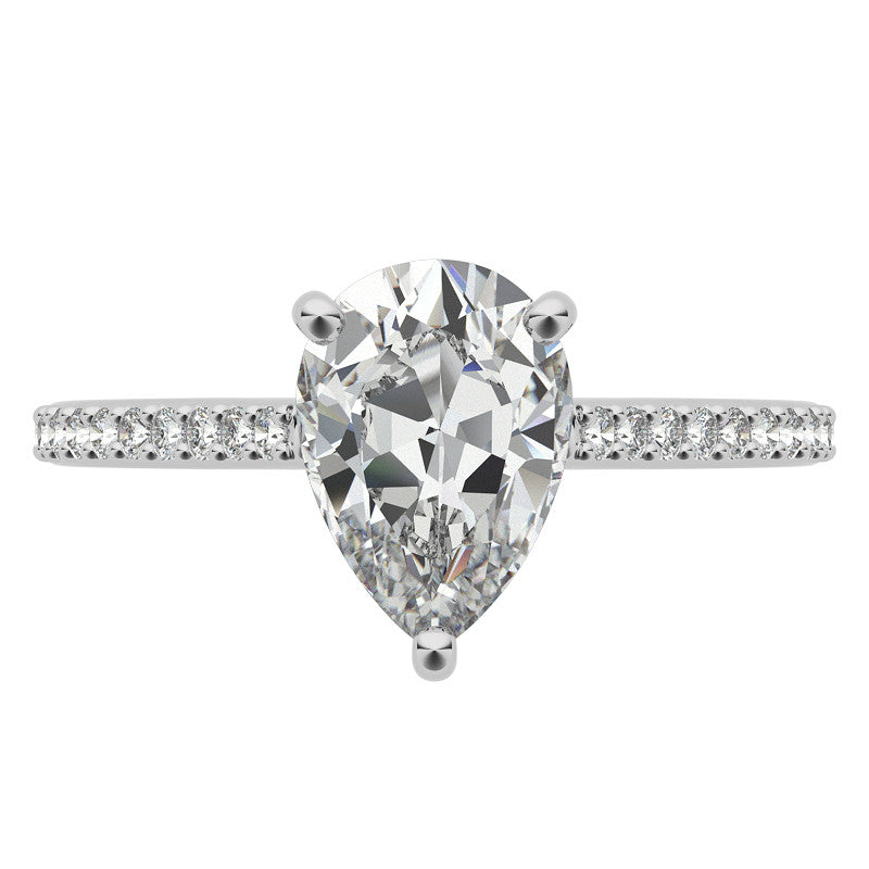 Pear Accented Engagement Ring