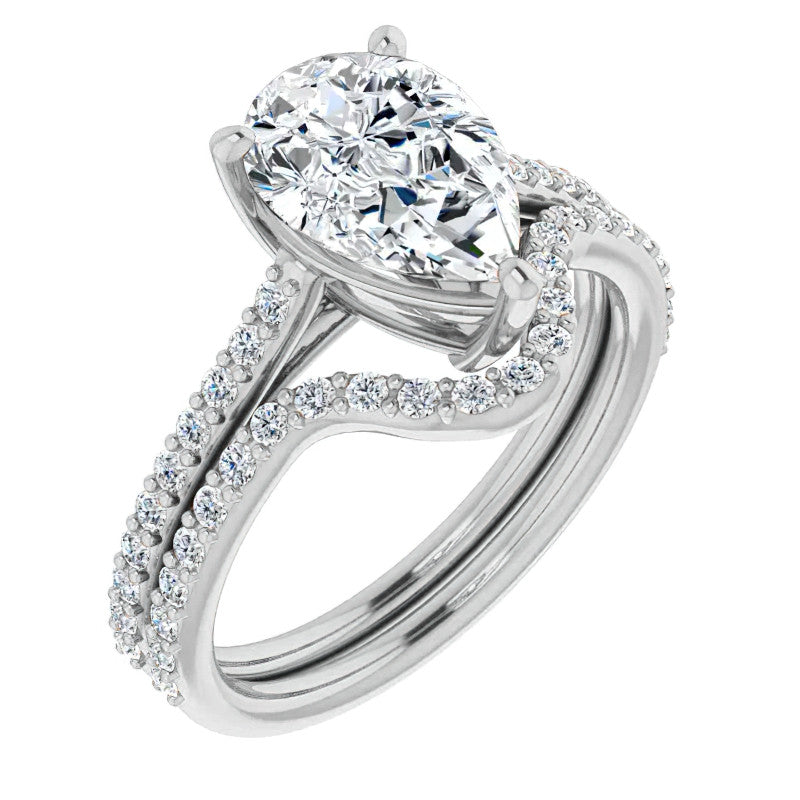 Pear Accented Engagement Ring