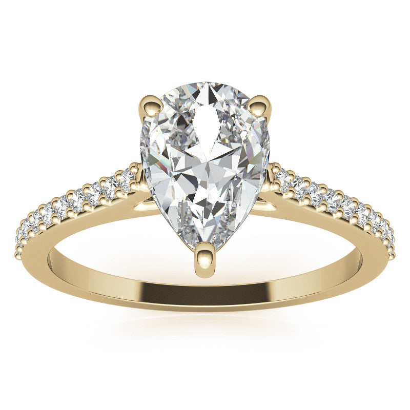 Pear Accented Engagement Ring