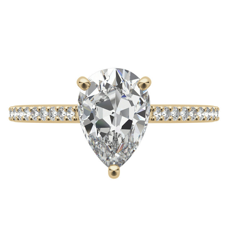 Pear Accented Engagement Ring