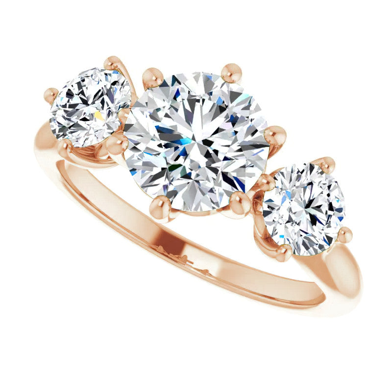 Round Brilliant Moissanite Heart Accented Three-Stone Ring