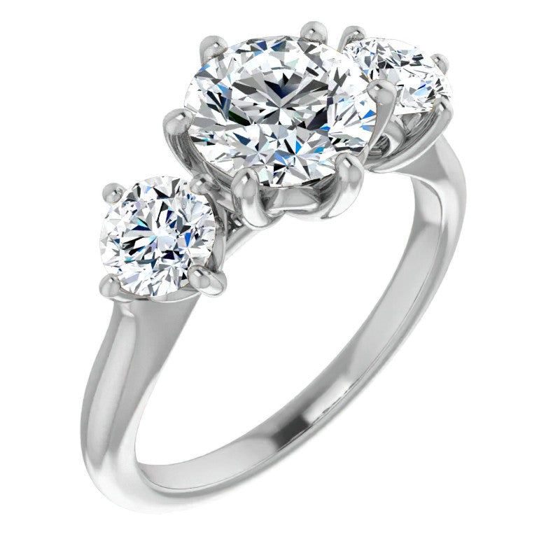 Round Brilliant Moissanite Heart Accented Three-Stone Ring