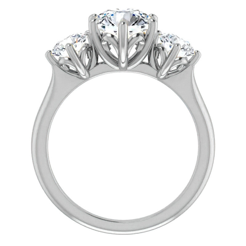 Round Brilliant Moissanite Heart Accented Three-Stone Ring