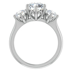 Round Brilliant Moissanite Heart Accented Three-Stone Ring