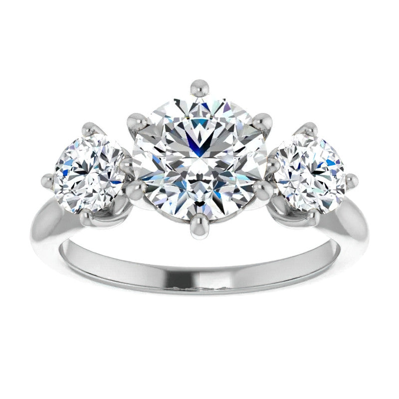 Round Brilliant Moissanite Heart Accented Three-Stone Ring