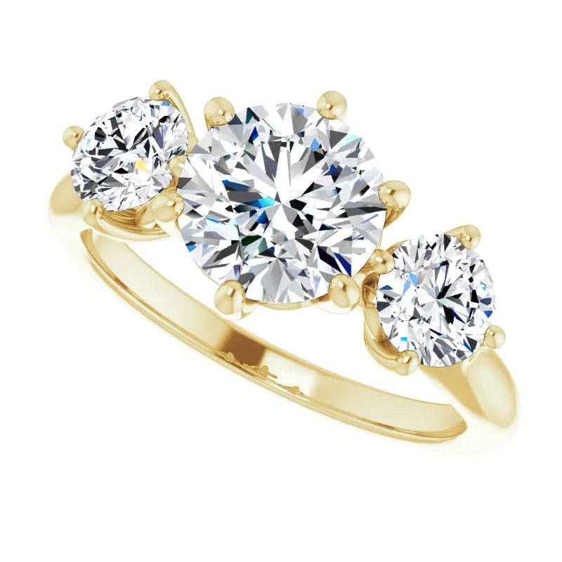 Round Brilliant Moissanite Heart Accented Three-Stone Ring