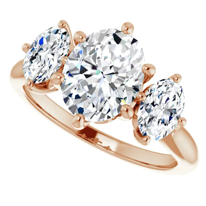 Oval Moissanite Heart Accented 3-Stone Ring