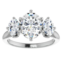 Oval Moissanite Heart Accented 3-Stone Ring