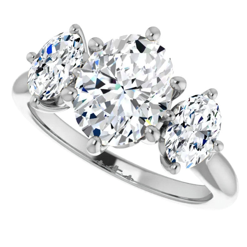 Oval Moissanite Heart Accented 3-Stone Ring