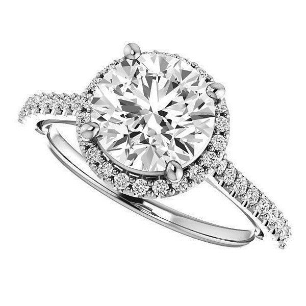 Round Brilliant Cathedral Halo Engagement Ring with Heart Accent