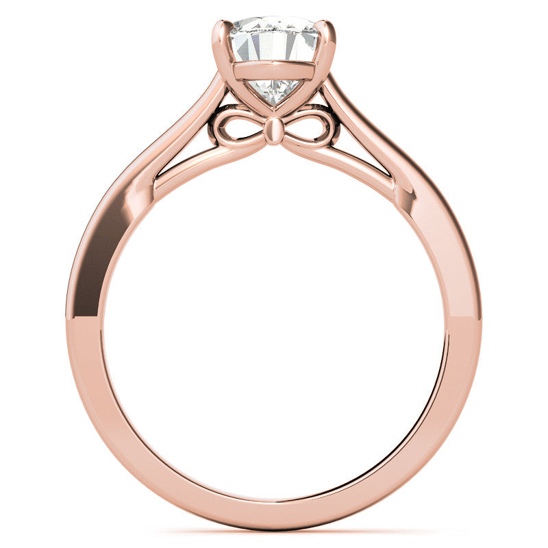 Oval Solitaire Engagement Ring with Bow Accent