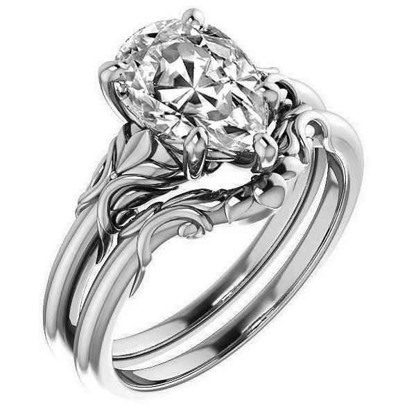 Pear cut Moissanite Engagement Ring with Floral Accents