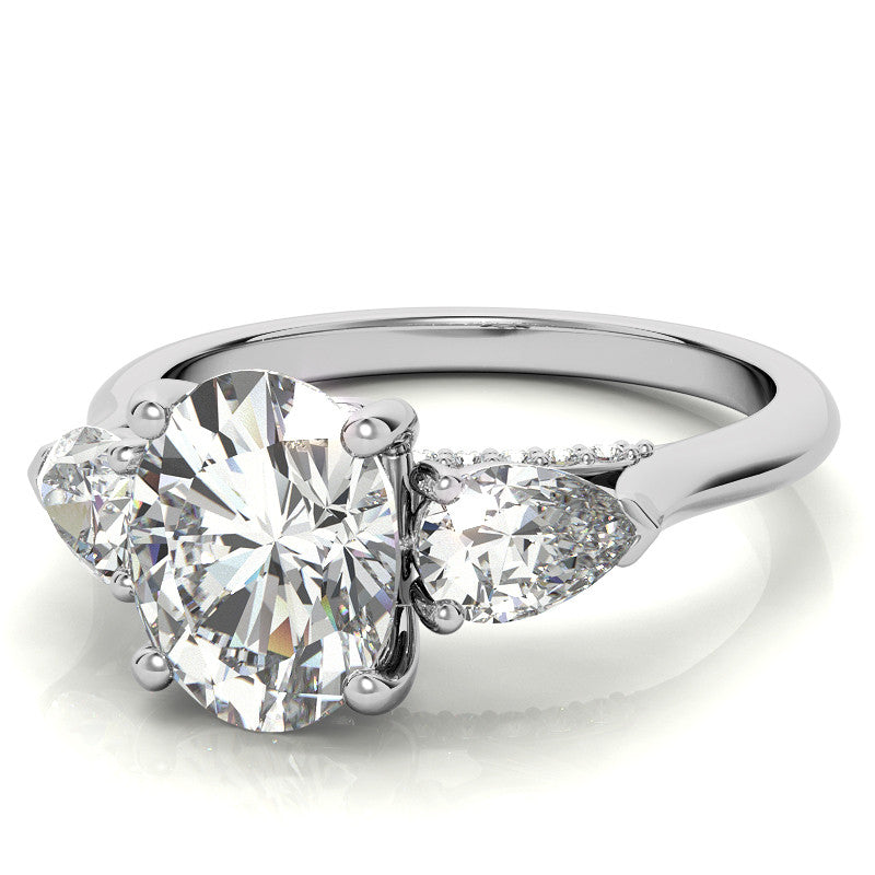 Oval and Pear 3-Stone Moissanite Cathedral Engagement Ring