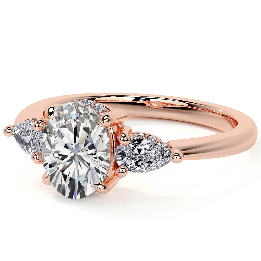 Oval and Pear 3-Stone Moissanite Engagement Ring with Hidden Hal