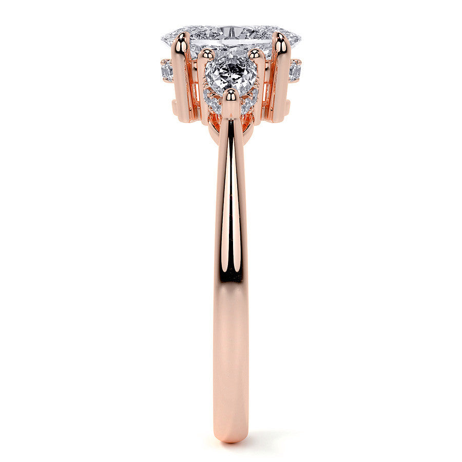 Oval and Pear 3-Stone Moissanite Engagement Ring with Hidden Hal