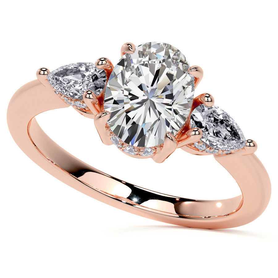 Oval and Pear 3-Stone Moissanite Engagement Ring with Hidden Hal