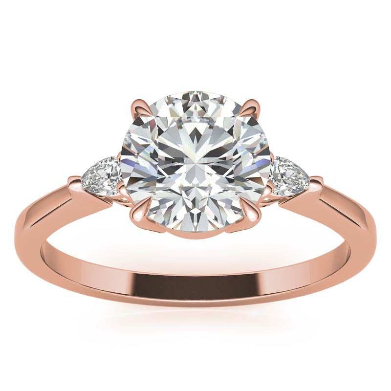 Round Brilliant Moissanite and Diamond Pear 3-Stone Engagement Ring