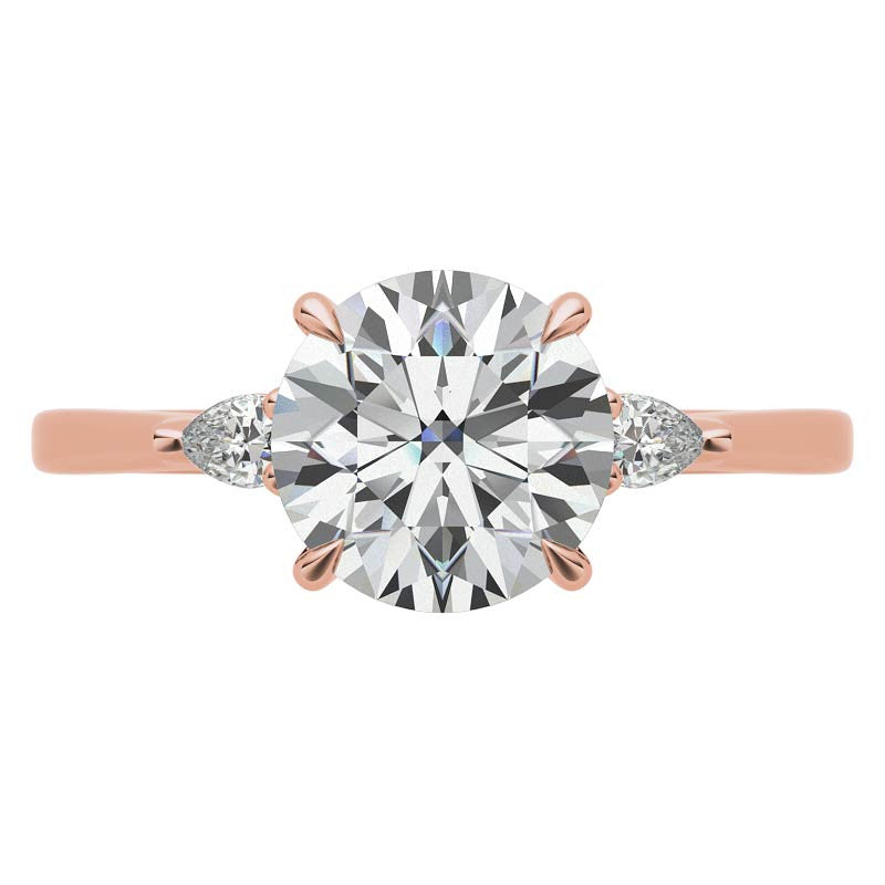 Round Brilliant Moissanite and Diamond Pear 3-Stone Engagement Ring