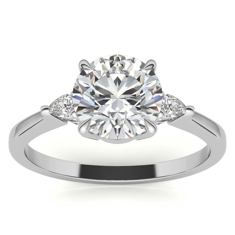 Round Brilliant Moissanite and Diamond Pear 3-Stone Engagement Ring