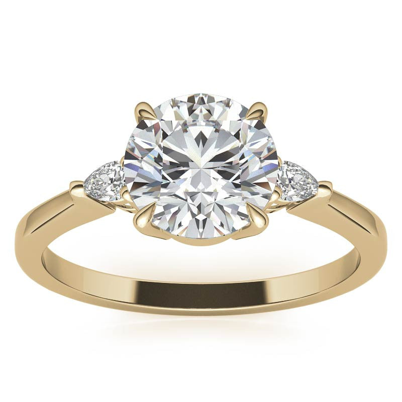 Round Brilliant Moissanite and Diamond Pear 3-Stone Engagement Ring