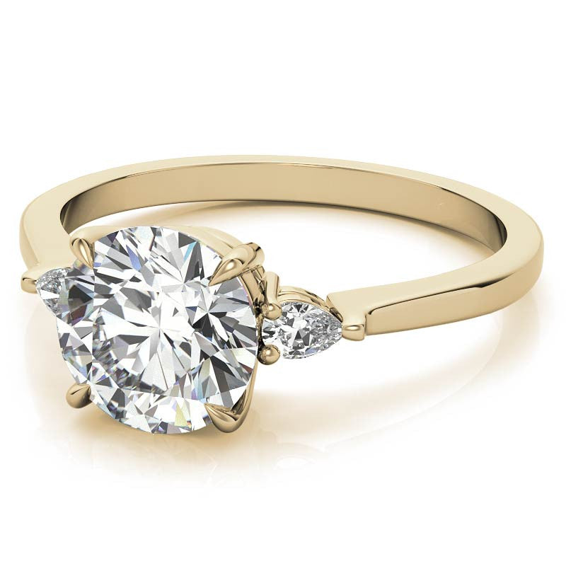 Round Brilliant Moissanite and Diamond Pear 3-Stone Engagement Ring
