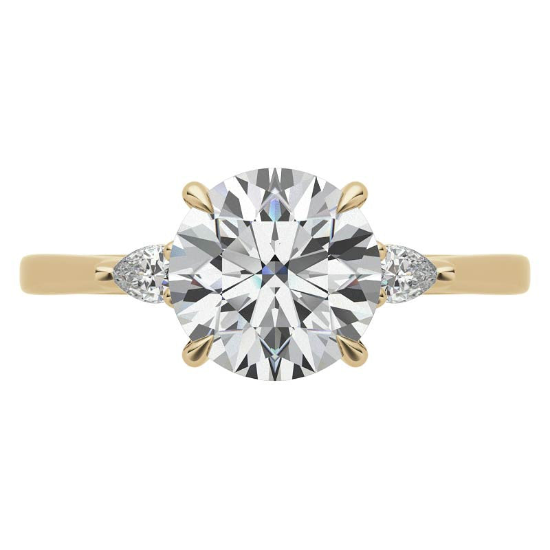 Round Brilliant Moissanite and Diamond Pear 3-Stone Engagement Ring