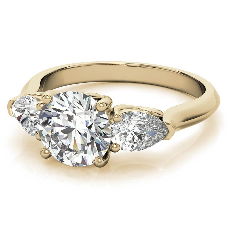 Round and Pear Moissanite 3-Stone Ring