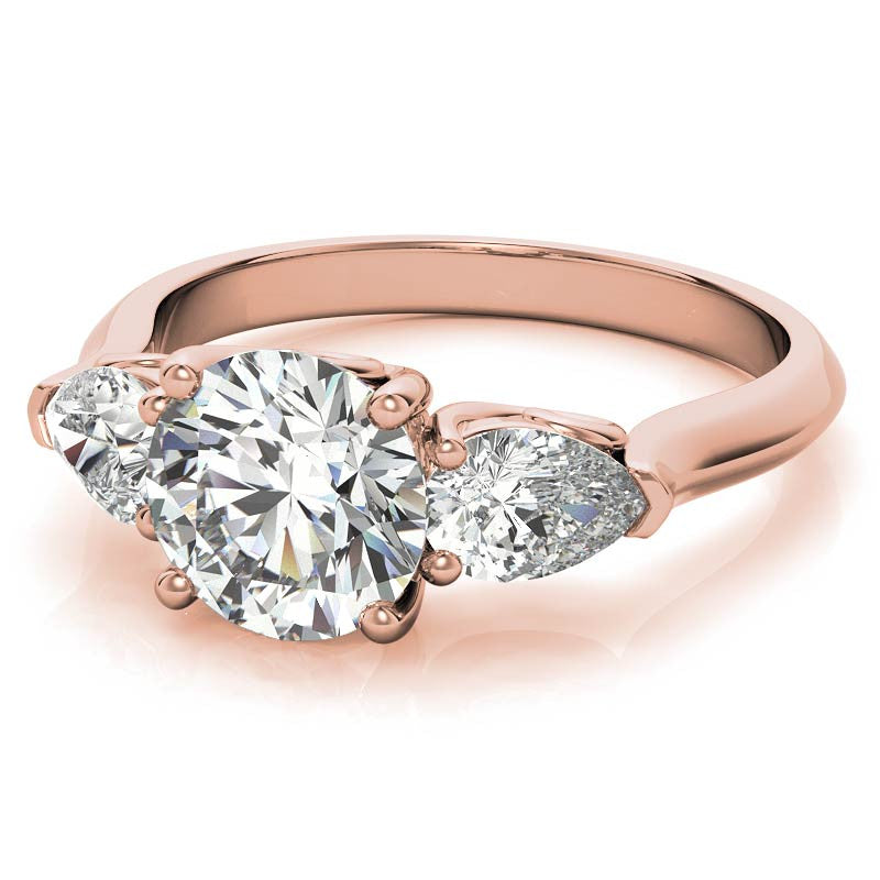 Round and Pear Moissanite 3-Stone Ring