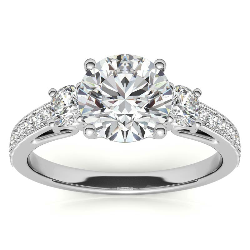 Round Brilliant Moissanite Three-Stone Scroll Accent Engagement Ring