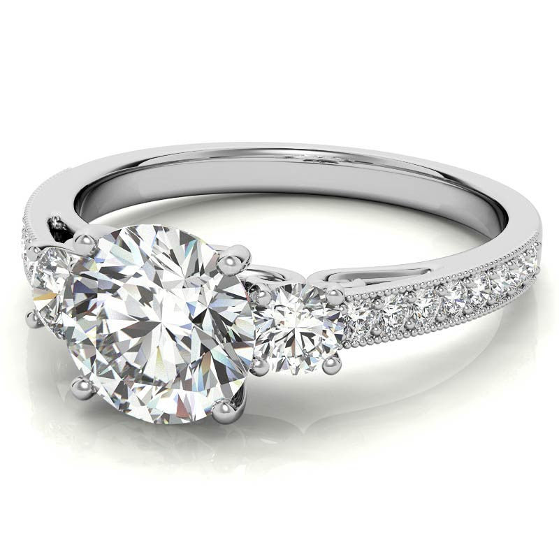 Round Brilliant Moissanite Three-Stone Scroll Accent Engagement Ring