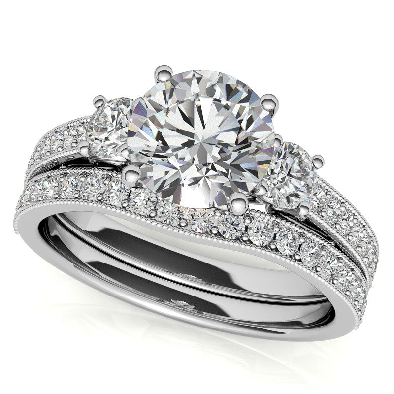 Round Brilliant Moissanite Three-Stone Scroll Accent Engagement Ring