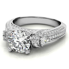 Round and Pear Moissanite 3-Stone Ornate Engagement Ring