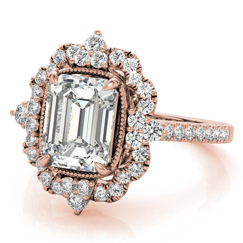 Ornate Emerald / Radiant Moissanite Graduated Halo Engagement Ring