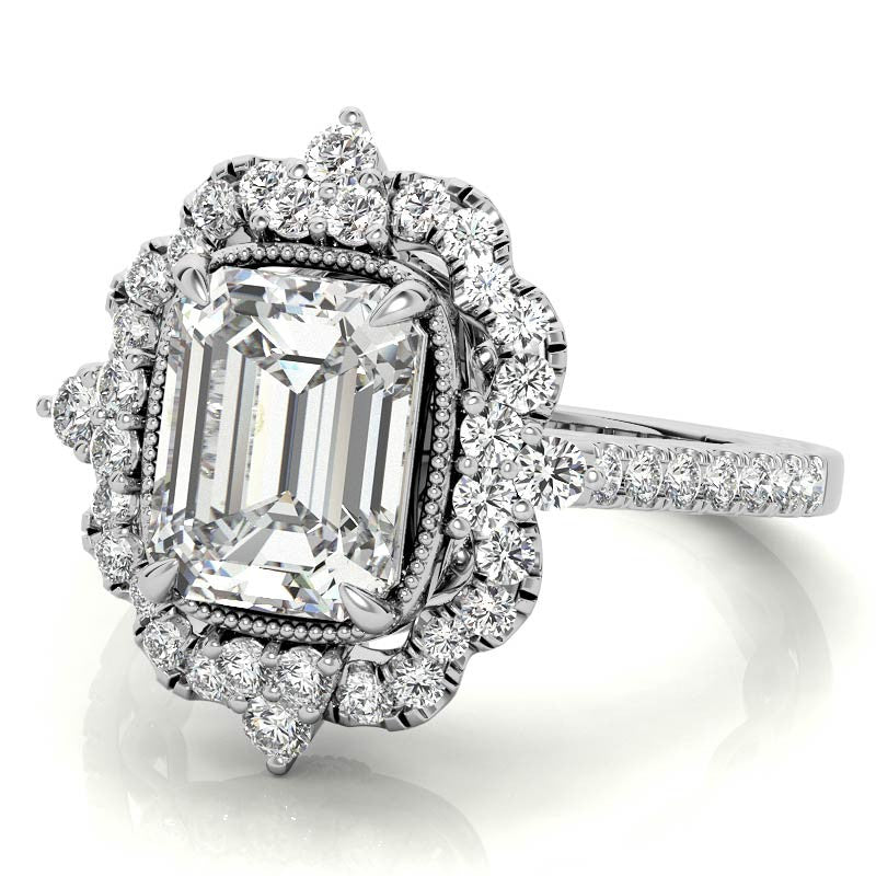 Ornate Emerald / Radiant Moissanite Graduated Halo Engagement Ring