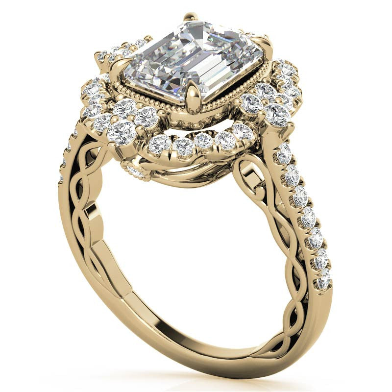 Ornate Emerald / Radiant Moissanite Graduated Halo Engagement Ring