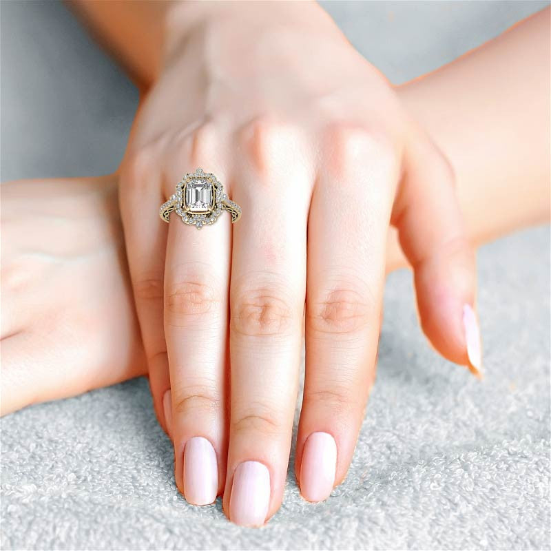 Ornate Emerald / Radiant Moissanite Graduated Halo Engagement Ring